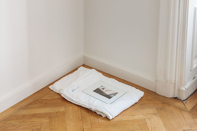 Patricia L. Boyd, Sea and Air, 2023, Bed sheet, thread, print, glass, 4&nbsp;×&nbsp;59&nbsp;×&nbsp;37 cm