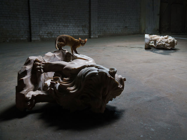 Nina Beier, Total Loss, 2020, site-specific installation, marble lions, milk, performance, dimensions variable Installation view and suddenly it all blossoms, RIBOCA 2, The 2nd Riga International Biennial of Contemporary Art,&nbsp;2020