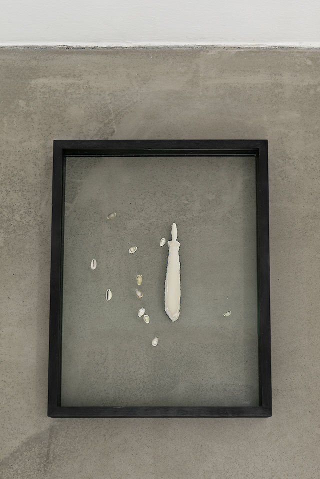 Benoît Maire, Weapon On The Ground, 2013, Eleven porcelain shells, resin, clay,&nbsp;frame