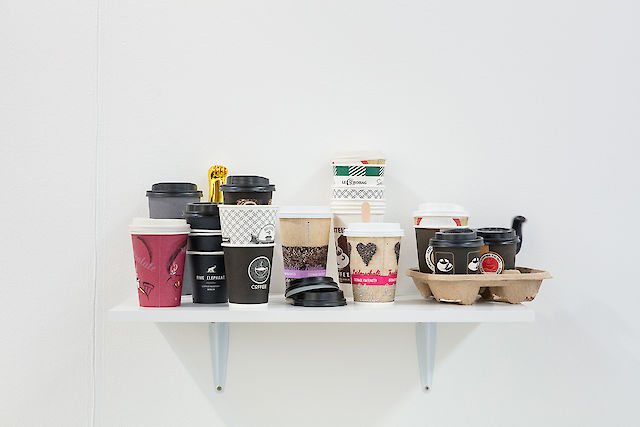 Nina Beier, Business, 2018, Papercoffee cups, arm from maneki-neko, dimensions variable