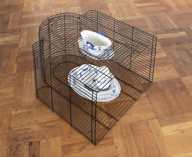 Nina Beier, Empire, 2020, ​‘Empire’ porcelain dinnerware by B&amp;G, Royal Copenhagen and metal wire bird cage, 39&nbsp;×&nbsp;64&nbsp;×&nbsp;52 cm, photo by Malle Madsen